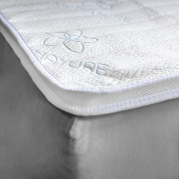 What makes a high-end hotel mattress topper so luxurious?